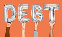 Gray balloon letters forming the word debt<br />