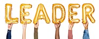 Golden balloon letters forming the word leader