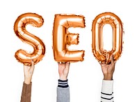 Orange balloon letters forming the word SEO