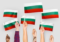 Hands waving flags of Bulgaria