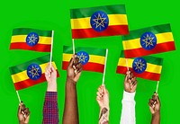 Hands waving flags of Ethiopia