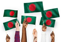 Hands waving flags of Bangladesh