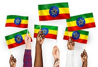 Hands waving flags of Ethiopia