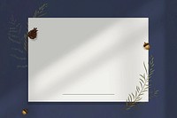 Blue wall shadow blank paper frame with acorn decoration