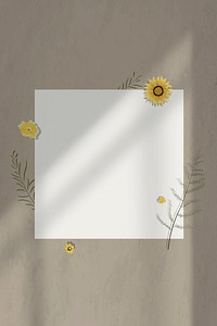Cream wall shadow blank paper frame background with yellow flower decor