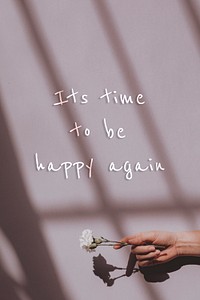 It's time to be happy again quote on a natural light background