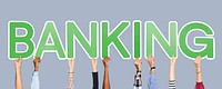 Hands holding up green letters forming the word banking