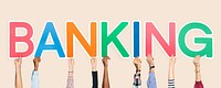 Hands holding up colorful letters forming the word banking