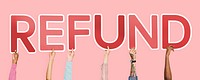 Hands holding up red letters forming the word refund<br />