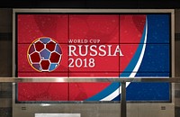 Advertising billboard with live football match