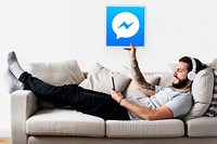 Man showing a Facebook Messenger icon
