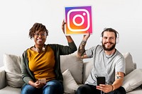 Couple showing an Instagram icon
