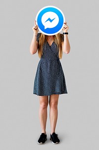 Woman showing a Facebook Messenger icon
