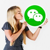 Woman blowing a kiss to a WeChat icon