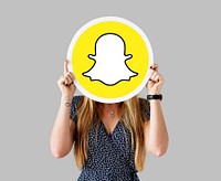 Woman showing a Snapchat icon