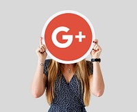 Woman holding a Google Plus icon