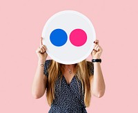 Woman holding a Flickr icon