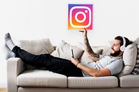 Man showing an Instagram icon