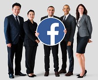 Business people showing a Facebook icon