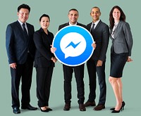 Business people showing a Facebook Messenger icon