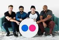 People holding a Flickr icon