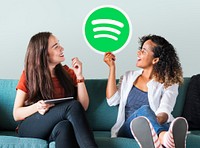 Women holding a Spotify icon