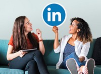 Women holding a Linkedin logo