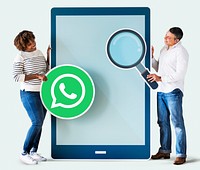 Couple searching for WhatsApp Messenger​​​​​​​ on a phone