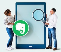 People holding an Evernote icon and a tablet