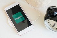 Hulu logo showing on a phone while charging. BANGKOK, THAILAND, 1 NOV 2018.