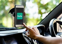 Person watching Hulu on a phone in a car. BANGKOK, THAILAND, 1 NOV 2018.