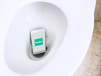 Hulu logo showing on a phone in a toilet bowl. BANGKOK, THAILAND, 1 NOV 2018.