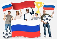 Diverse football fans holding the flag of Russia