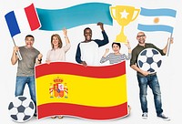 Diverse football fans holding the flags of Argentina, France and Spain