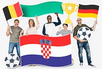 Diverse football fans holding the flags of Belgium, Croatia and Germany