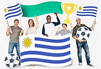 Diverse football fans holding the flag of Uruguay