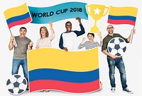 Diverse football fans holding the flag of Colombia