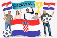Diverse football fans holding the flag of Croatia