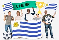 Diverse football fans holding the flag of Uruguay