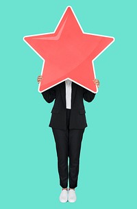 Businesswoman holding a golden star rating symbol