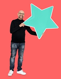 Cool man holding a star icon