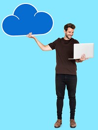 Cheerful man using a laptop and a cloud computing icon