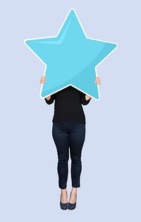 Businesswoman holding a star rating symbol