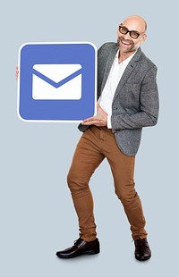 Mature man holding an email icon