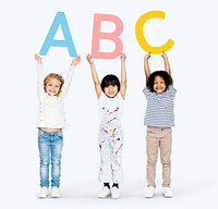 Diverse happy kids learning the ABC