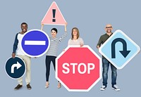 Happy diverse people holding road signs