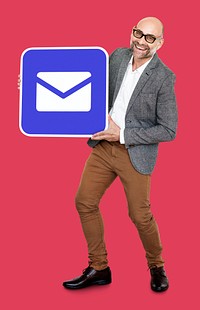 Mature man holding an email icon