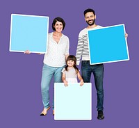 Happy family holding blank boards