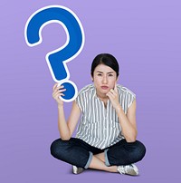 Woman holding a question mark icon