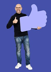 Cheerful man showing a thumbs up icon